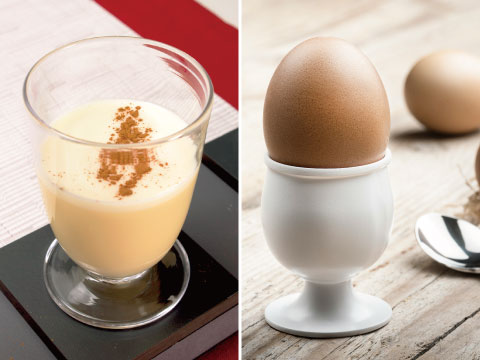 Side-by-side image of a creamy eggnog cocktail dusted with cinnamon and a soft-boiled egg in an egg cup with a spoon