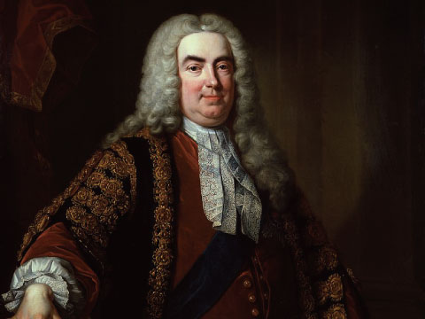 A formal portrait of Sir Robert Walpole in an ornate robe and powdered wig, widely regarded as Britain's first Prime Minister