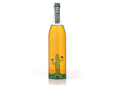 A tall bottle of Porfidio tequila featuring a hand-blown glass cactus embedded at the base, photographed against a plain white background