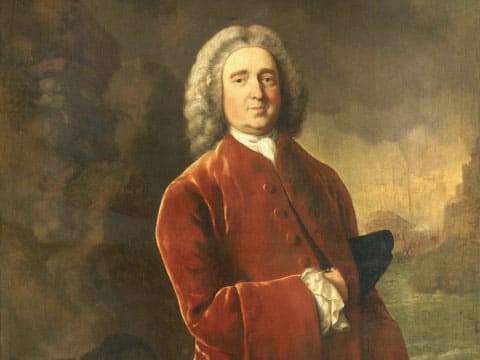 A historical oil portrait of Admiral Edward Vernon of the British Royal Navy, wearing a red velvet coat, associated with the origin of the Grog cocktail