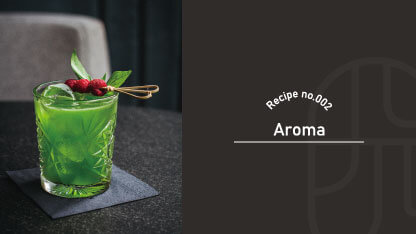 A vivid green Aroma cocktail in a cut-crystal rocks glass, garnished with raspberries and fresh basil leaves, with "Recipe no.002, Aroma" text overlay