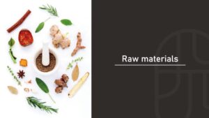 Various herbs, spices, and botanicals including cinnamon, ginger, and rosemary arranged around a mortar and pestle with ground spice inside
